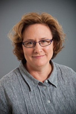 Dr Belle Cominos